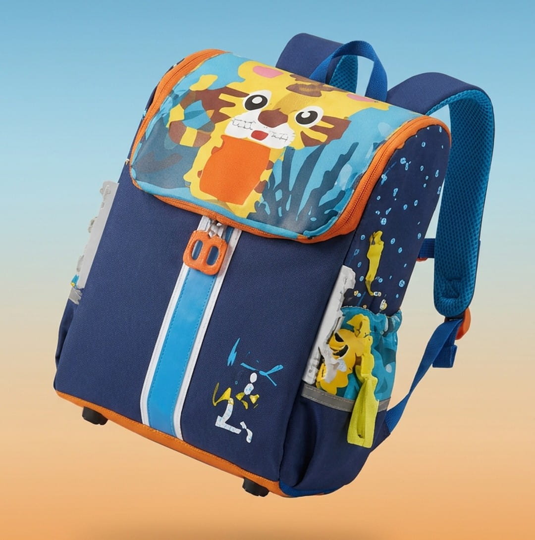 Colorful cartoon kids backpack by NOVA featuring playful character designs and adjustable straps for young children.