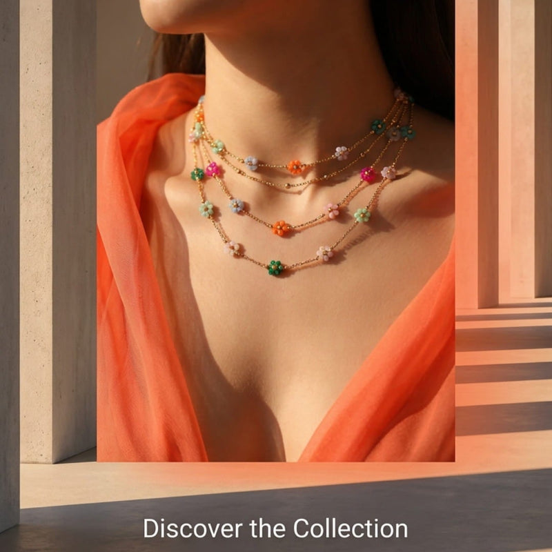 A promotional graphic for floral chain necklaces, featuring a model wearing three layered necklaces with colorful flowers and beads. The image includes text overlays reading 'Mix, match, and make a statement with our vibrant floral chains.