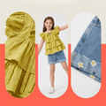 NOVA cute girls' summer clothing set for ages 7-11, featuring colorful top and shorts on a girl modeling the outfit.