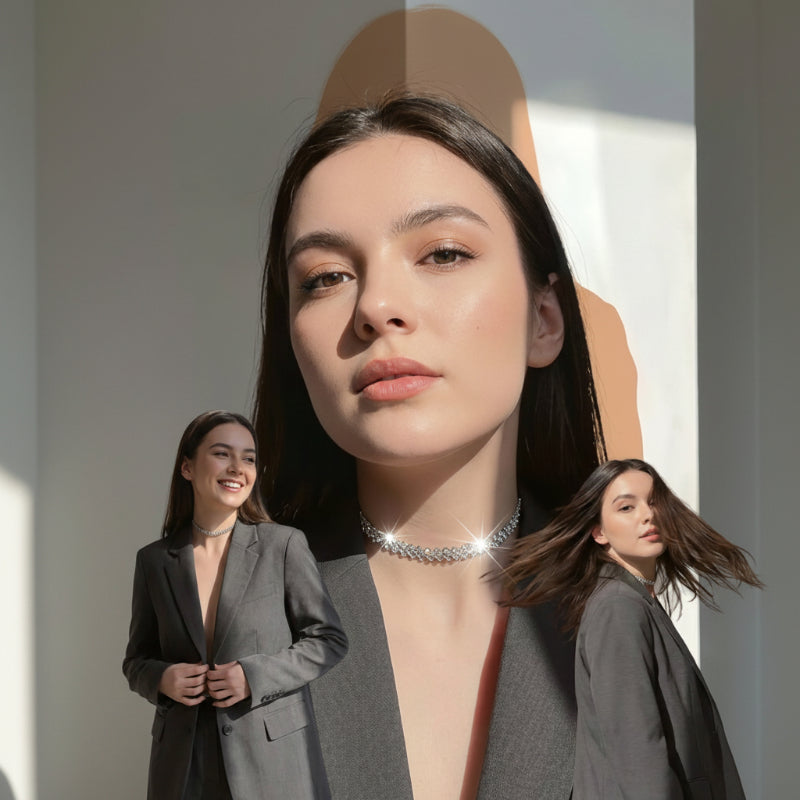 A woman in a gray blazer is shown wearing a sparkling silver choker necklace, with text at the top reading 'Transform your look from simple to stunning in an instant. Sparkle with effortless elegance.