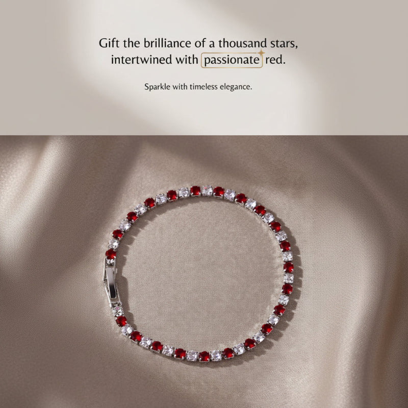 A tennis-style bracelet with alternating red gemstones and clear stones in a silver-toned setting, displayed on a beige fabric surface. Text at the top reads, 'Gift the brilliance of a thousand stars, intertwined with passionate red.