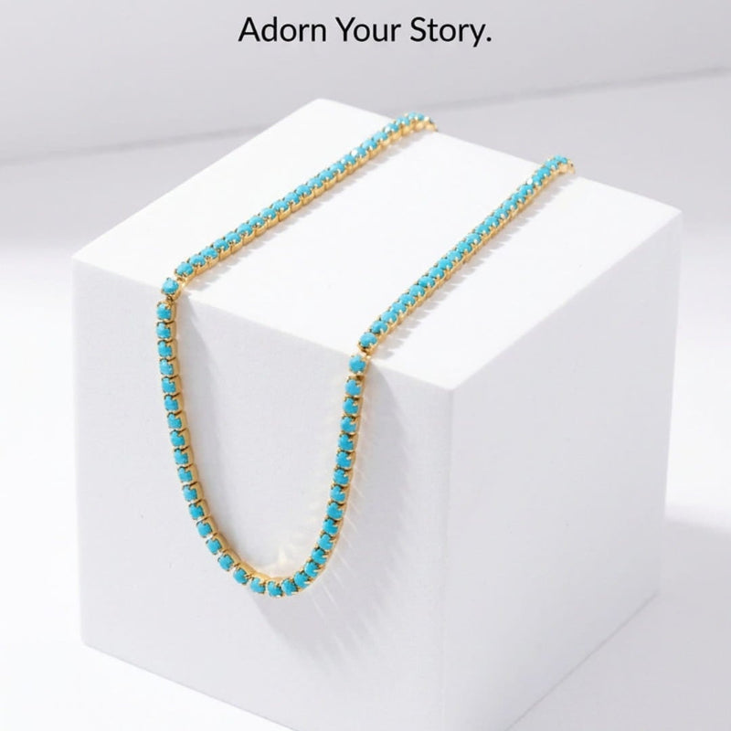 A turquoise necklace with gold links draped over a white display block, with promotional text above and below on a light gray background.