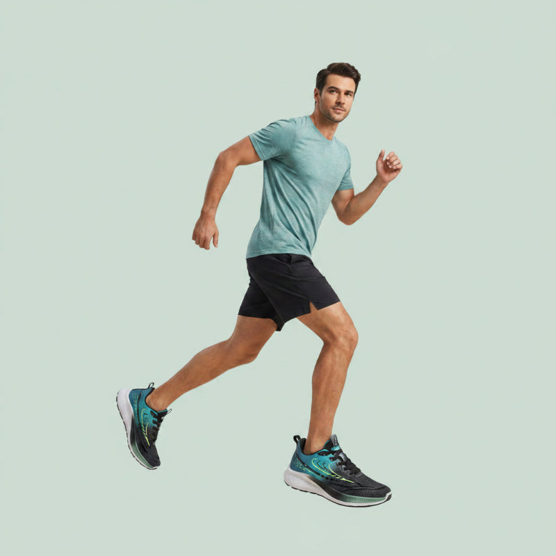 A man running in a light blue t-shirt and black shorts, wearing blue and black running shoes, within a modern, minimalist studio setting with text overlays promoting a men's collection.