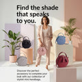 A promotional ad for stylish mini handbags featuring a woman in a beige suit holding a pink bag, surrounded by several mini handbags in black, blue, gray, pink, and burgundy on pastel display blocks.