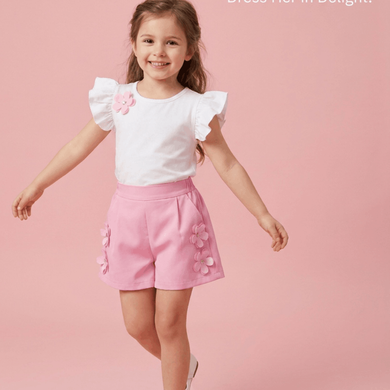 Girls short sleeve top and bow skirt set by NOVA for ages 4-7, featuring a stylish summer outfit for young girls.