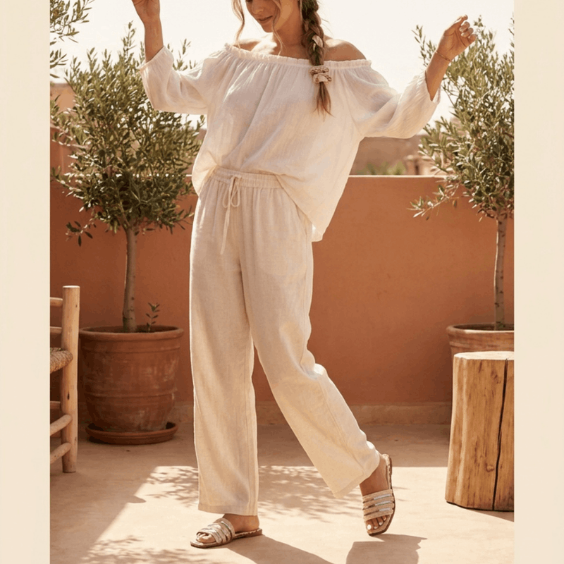 Women comfortable summer slippers by NOVA with soft fabric straps and cushioned soles, ideal for indoor and casual wear.