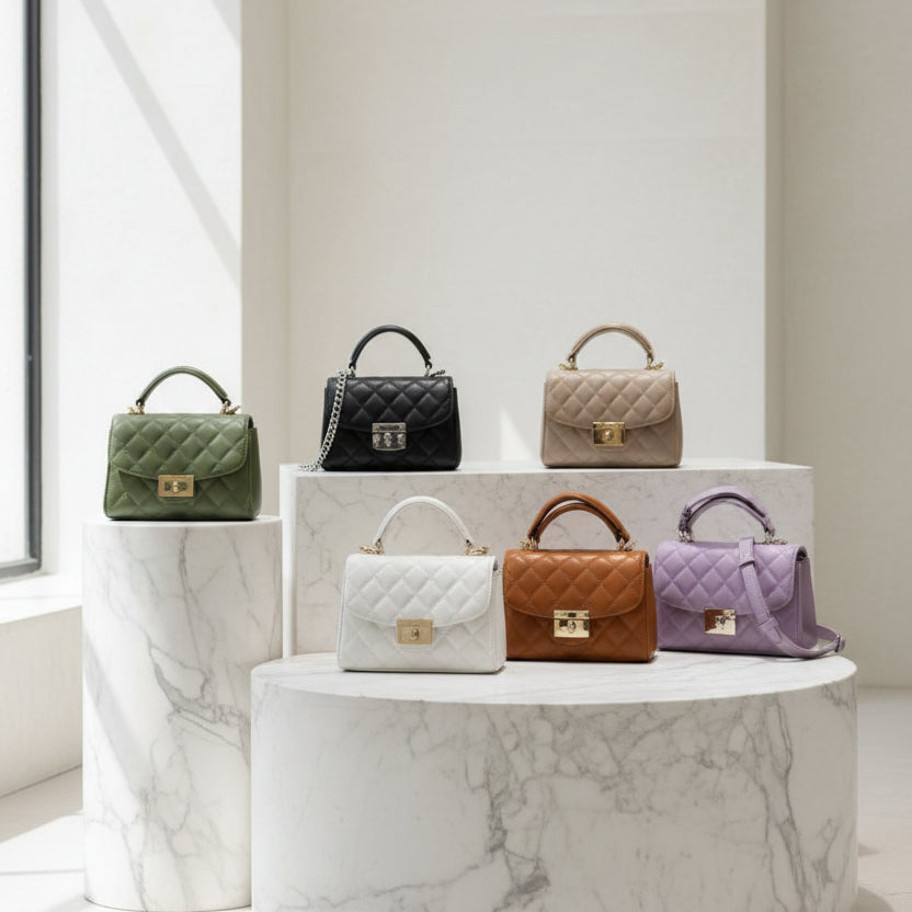 NOVA small square crossbody bag with chain strap and zipper, featuring a stylish design for women.